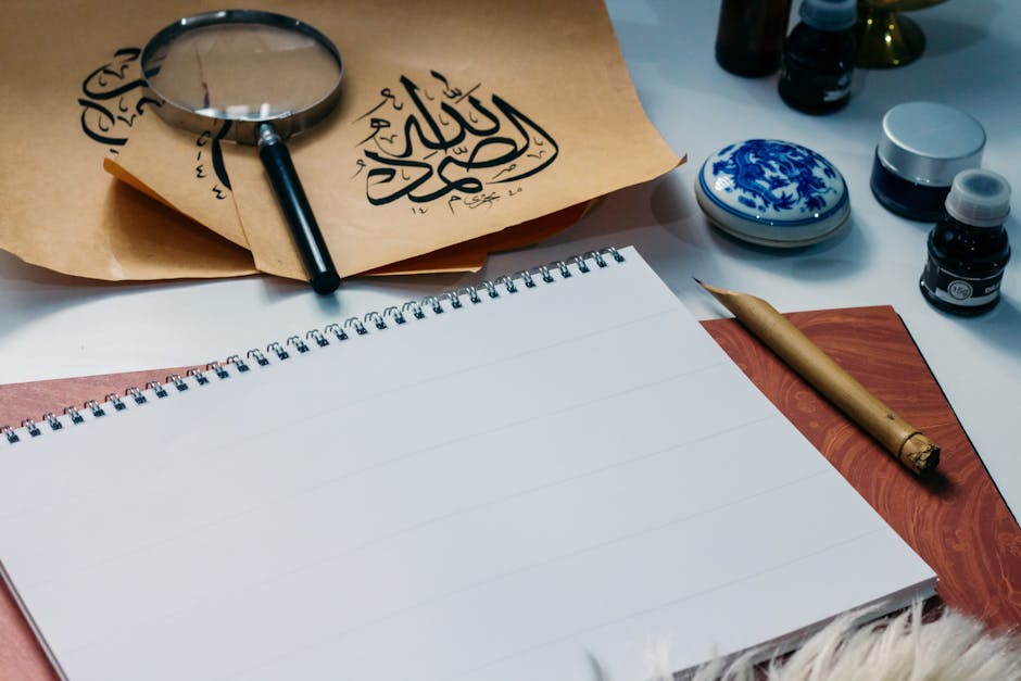 An Arabic script document on a wooden desk, ready for review in a right-to-left form workflow.